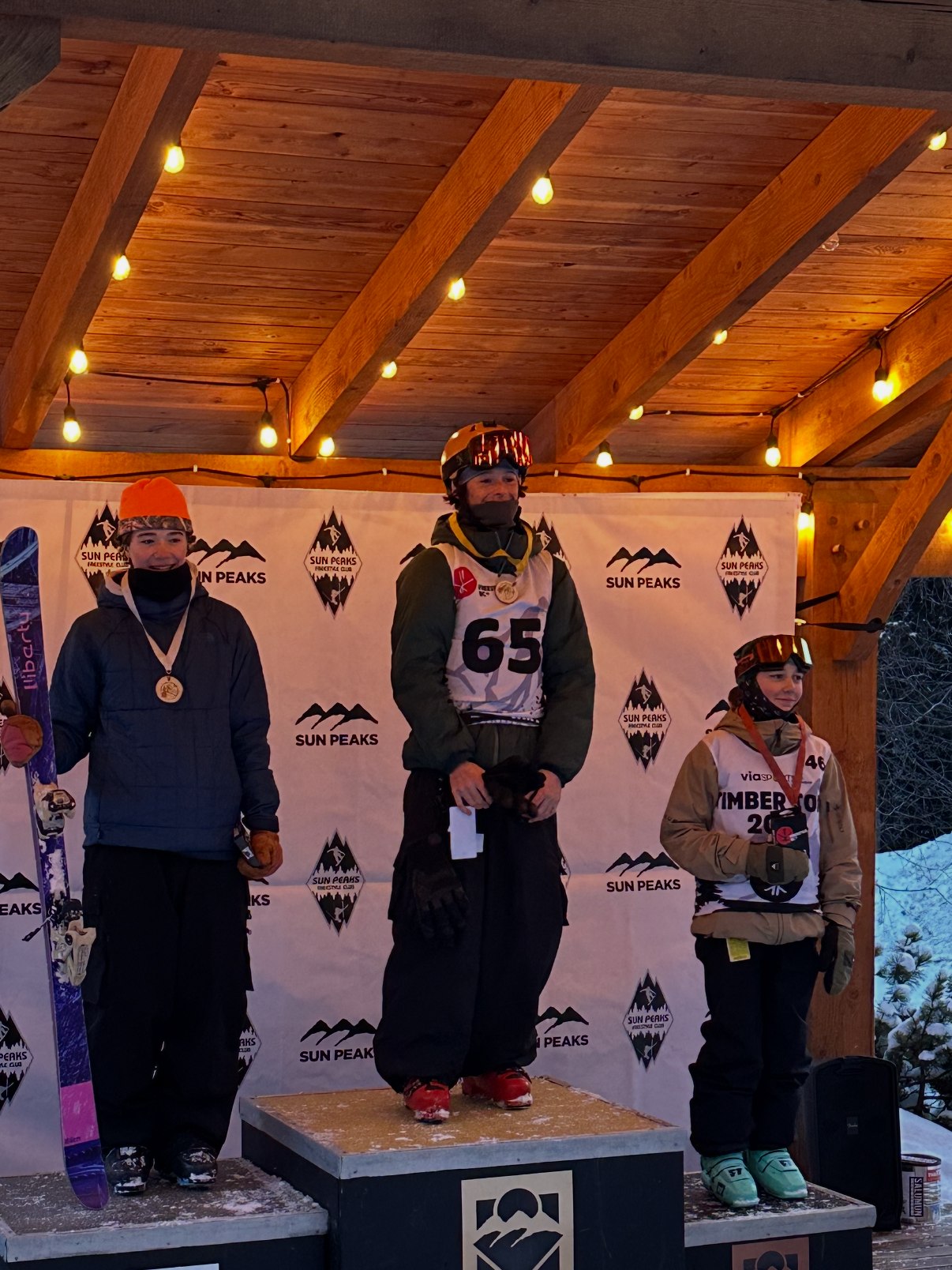 Byron Lambert on the top step of the slopestyle podium at Sun Peaks
