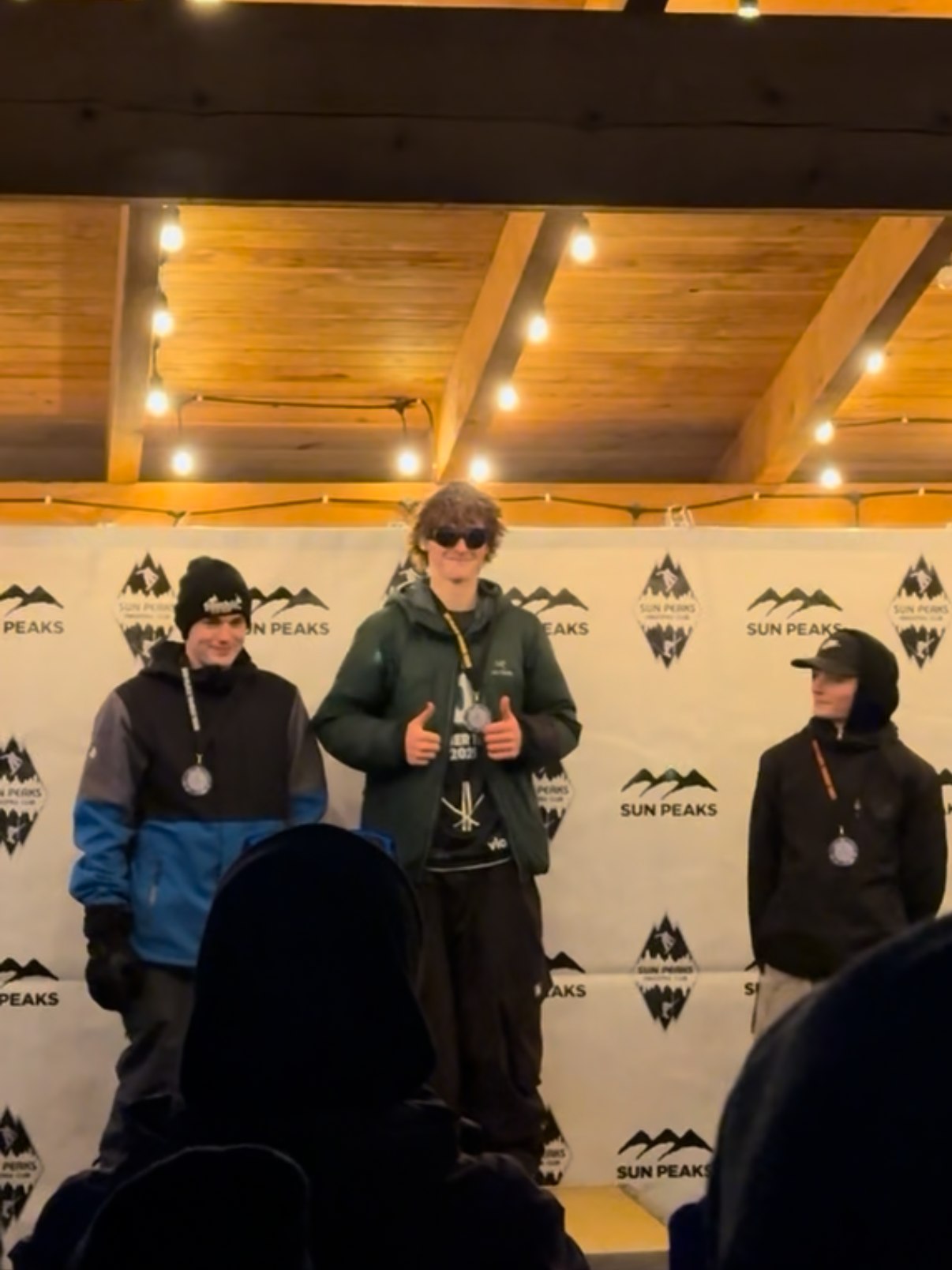 Byron Lambert on the top step of the slopestyle podium at Sun Peaks