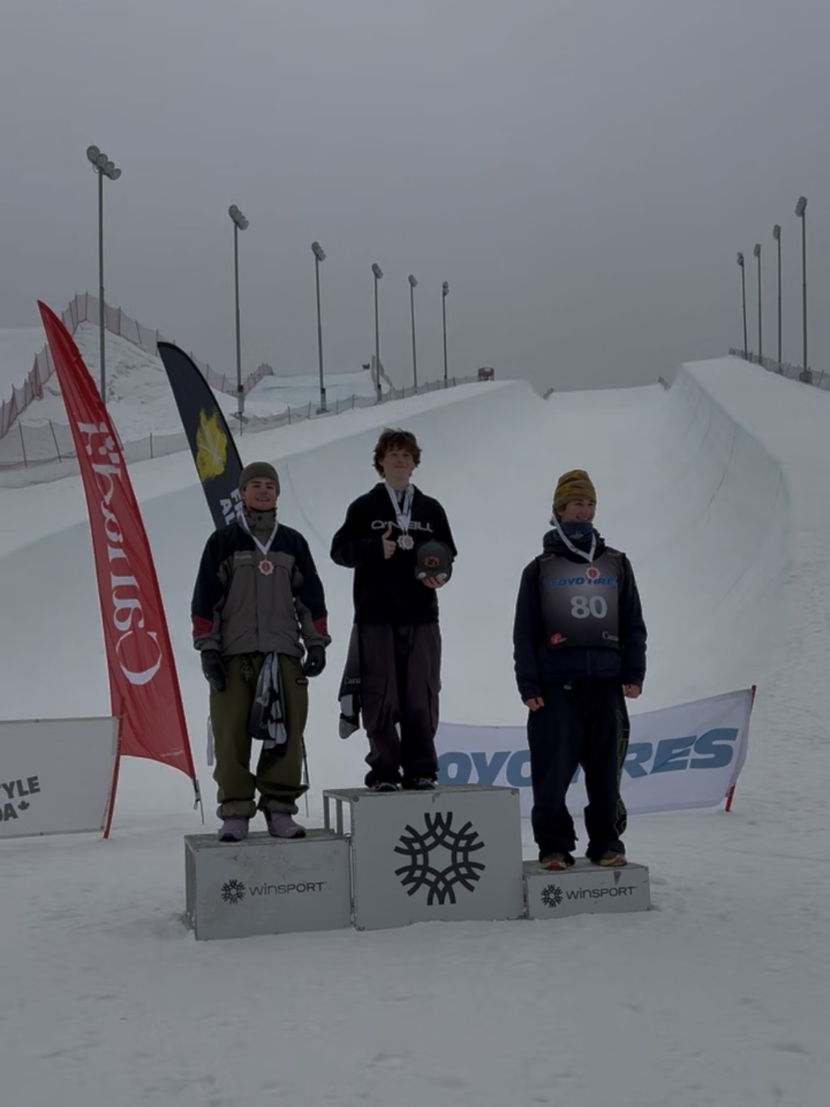 Byron Lambert on the top step of the big air podium in Calgary